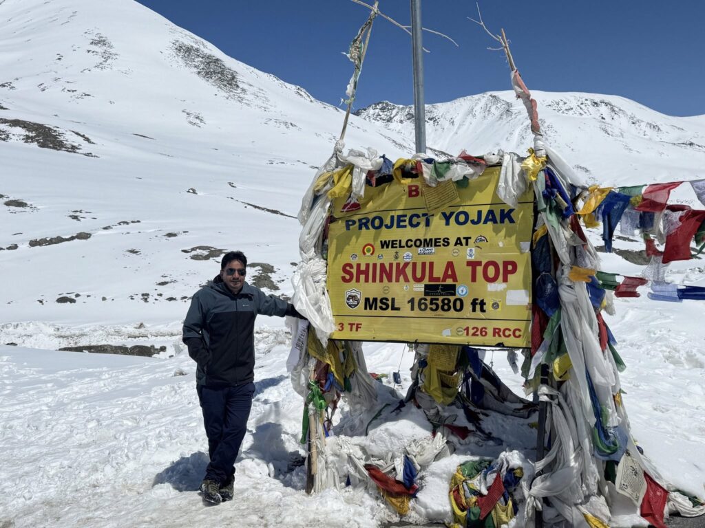 Shinkula Pass covered with snow in Lahaul Spiti, high altitude mountain road in Himachal Pradesh