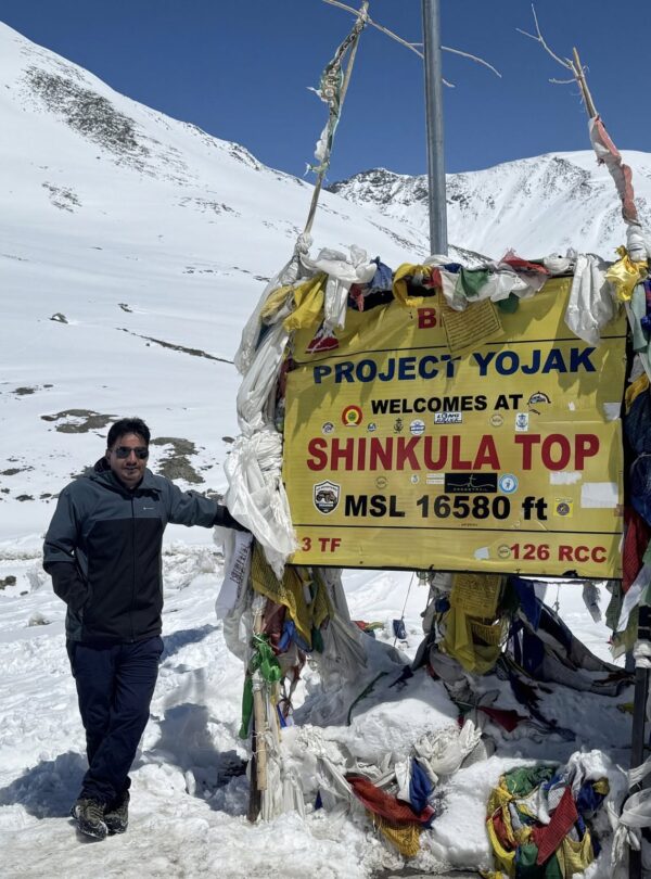 Shinkula Pass covered with snow in Lahaul Spiti, high altitude mountain road in Himachal Pradesh